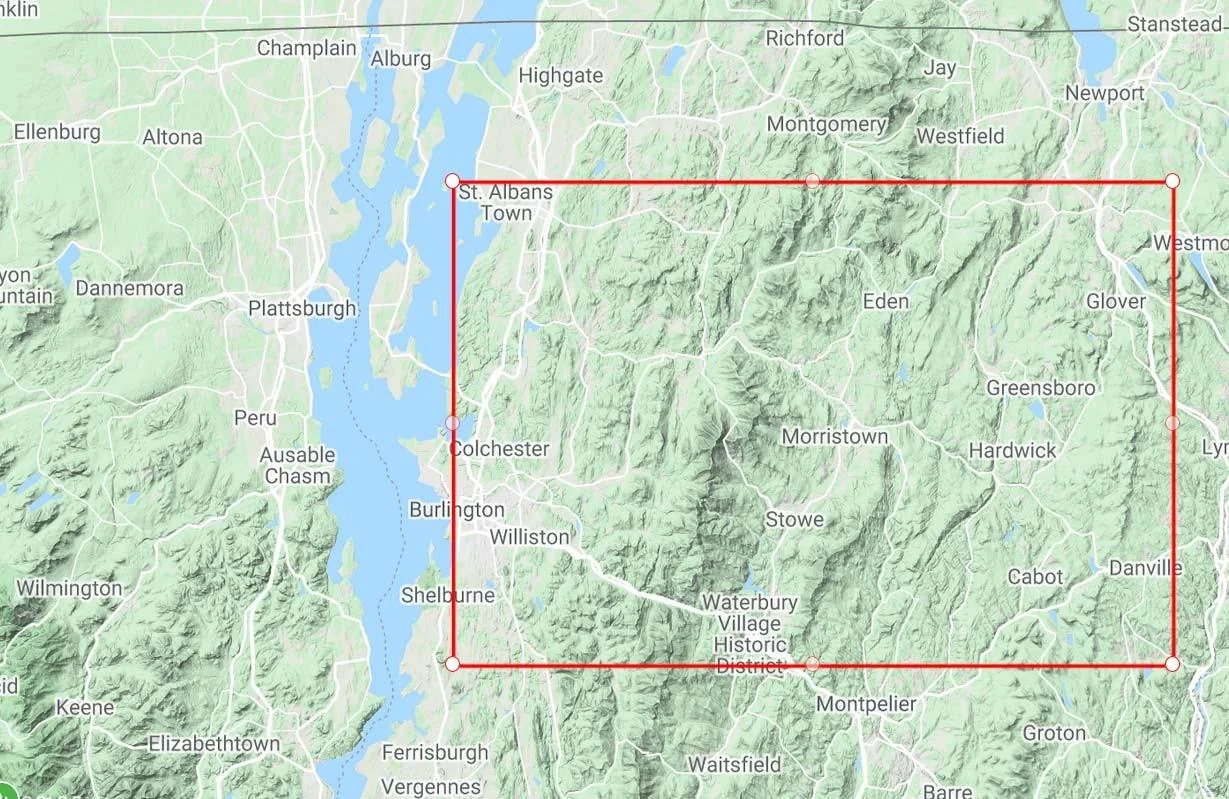 IGW-NET map display showing a rectangular model domain drawn over northern Vermont with corner handles for adjusting the domain size and shape