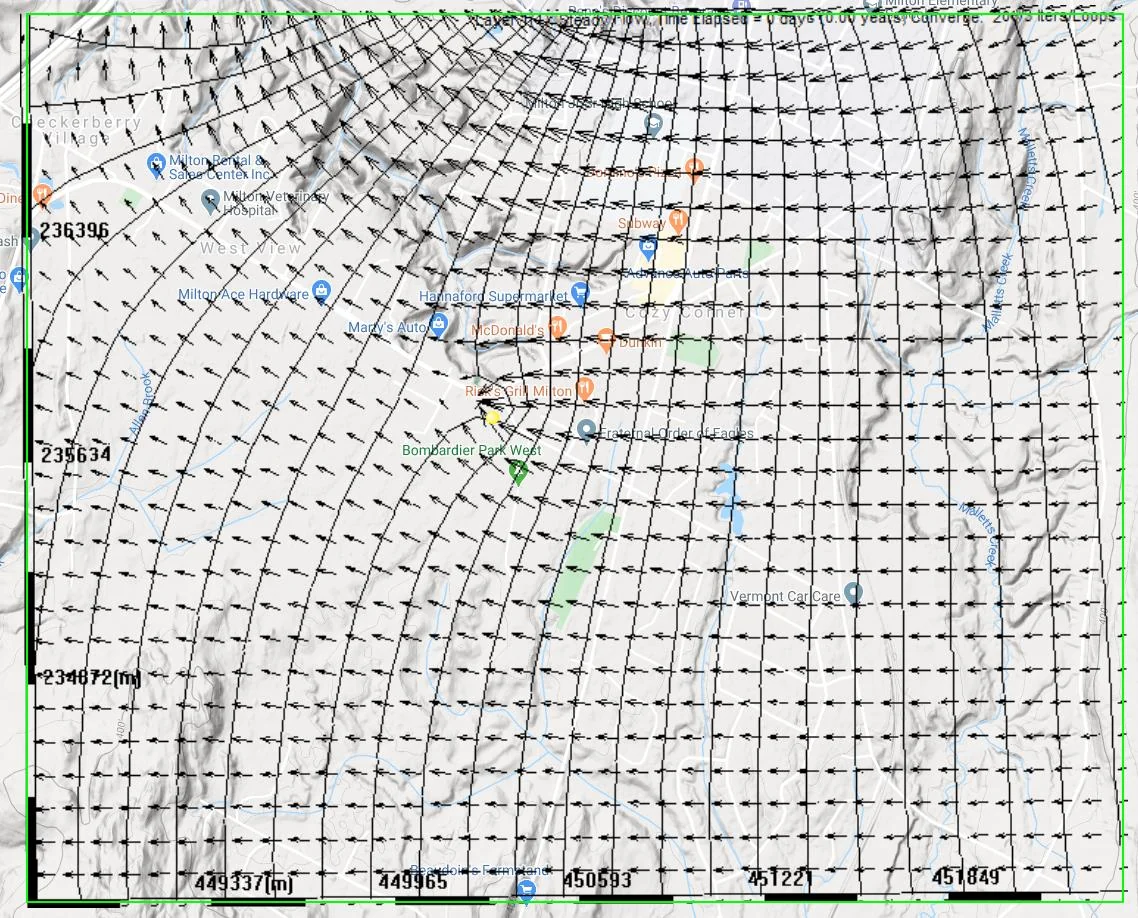 Simulated submodel results showing the well source water area delineated by backward particle tracking, with pathline envelope extending upgradient from the well