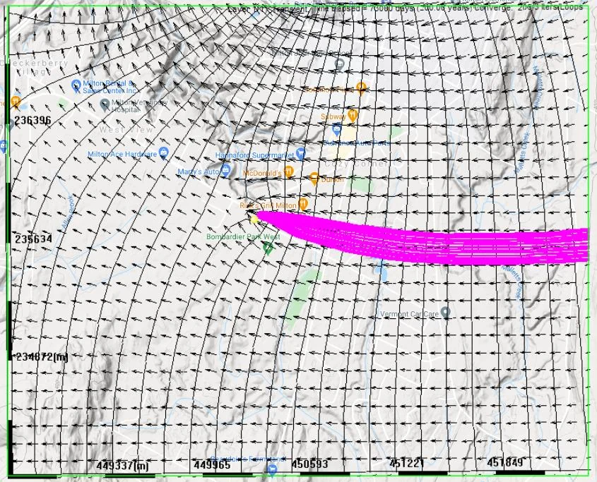 Forward particle tracking results showing potential contamination impact area downgradient from a hypothetical source, with particle pathlines (magenta) tracing the plume trajectory toward the pumping well
