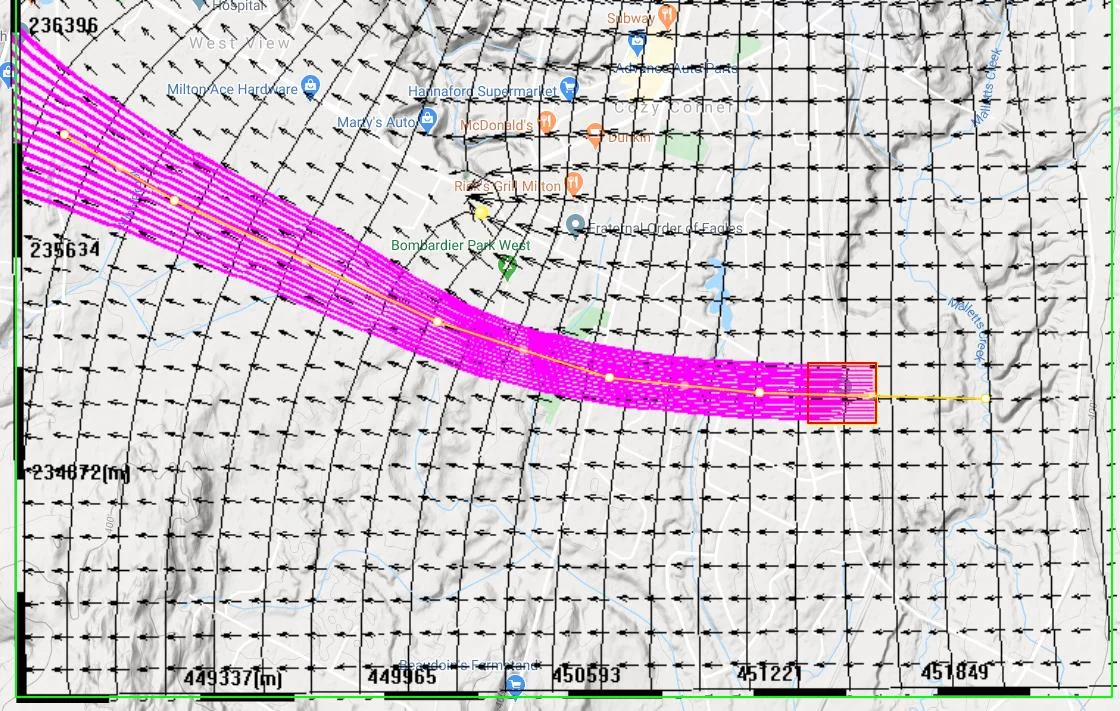 Forward particle tracking results showing the complete particle pathline envelope from the contamination source toward the pumping well, demonstrating advective transport patterns