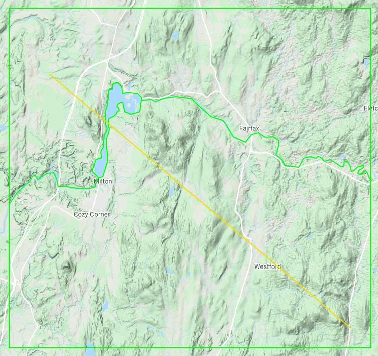Simulated submodel results with a pumping well active, showing localized convergence of groundwater flow and a head depression (cone of depression) near the well location